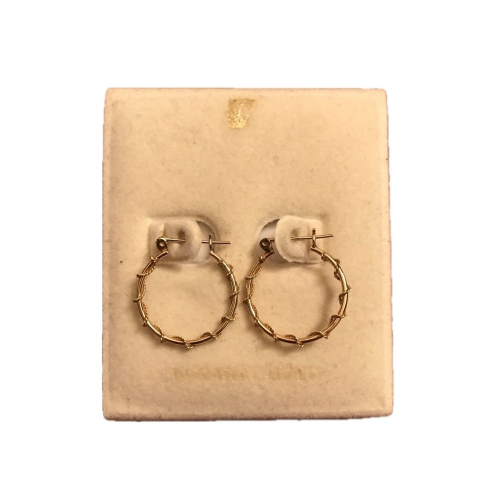 Thin gold hoops with rope/chain-wrapped detail